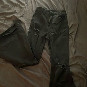 Distressed black bell bottom jeans